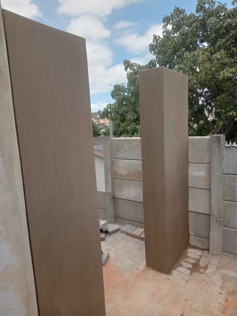 Smooth plastered columns mid-construction